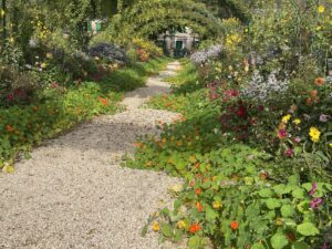 Monet's Giverny Gardens in Early Autumn: Vibrant Fall Colors and Seasonal Bloom at Claude Monet’s Home in Giverny, France