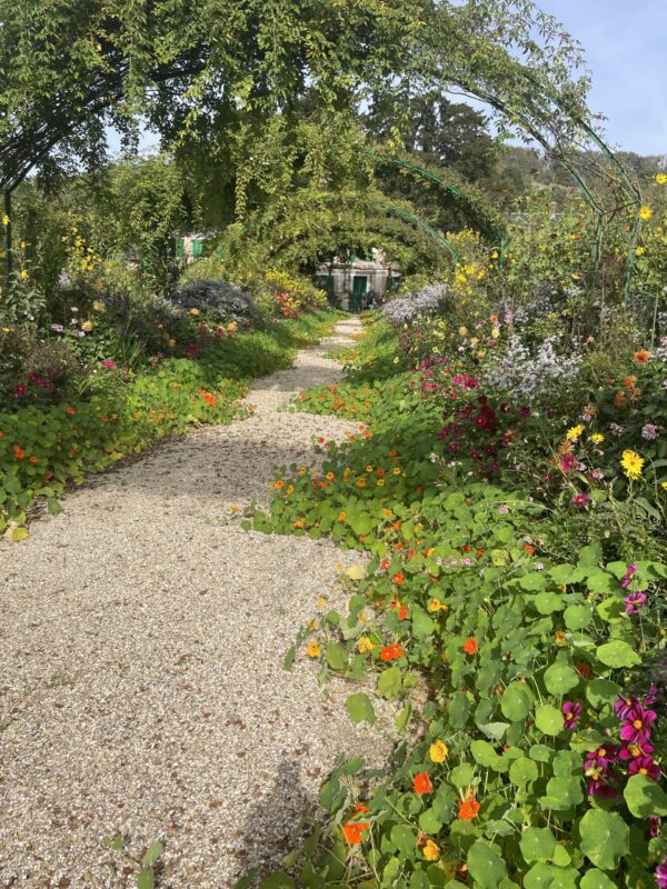 Monet's Giverny Gardens in Early Autumn: Vibrant Fall Colors and Seasonal Bloom at Claude Monet’s Home in Giverny, France