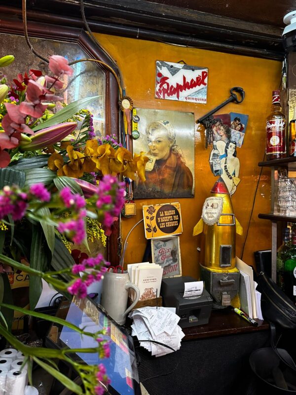 Charming interior decor of popular Paris restaurant Chez Paul in Bastille, 2024. Photo by Leah Gillis showcasing elegant furnishings and inviting ambiance.