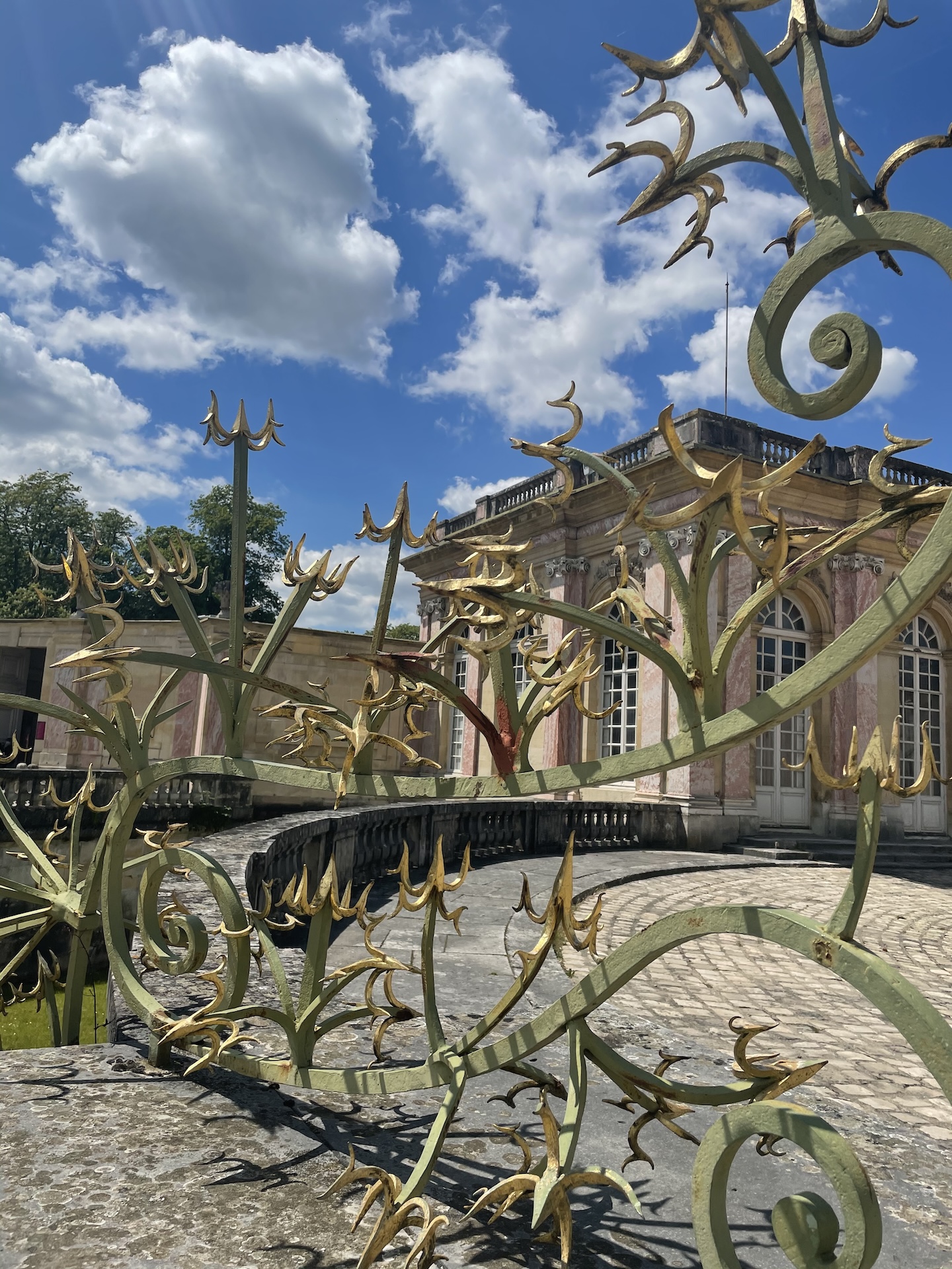 Elegant gate of Petit Trianon at Versailles, France, representing discipline and excellence. Captured in 2021 by Leah Gillis.