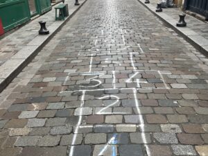 Charming and vibrant street scene in Bastille, Paris, showcasing fun and lively atmosphere, 2023. Photo by Leah Gillis highlighting local character and street activity.