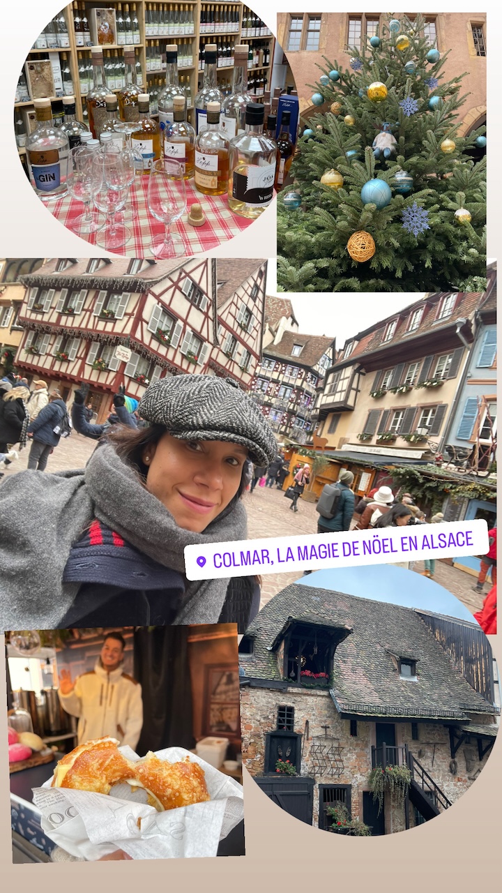 Festive atmosphere at Colmar Christmas market with twinkling lights, holiday decorations, and bustling visitors enjoying seasonal treats. Ah, France at holiday time...