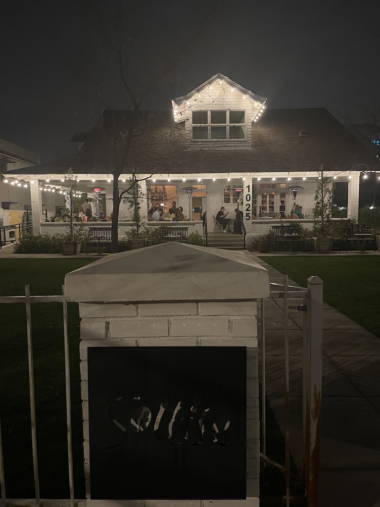 Sottise restaurant in Phoenix, a chic spot set in a craftsman house with inviting ambiance.