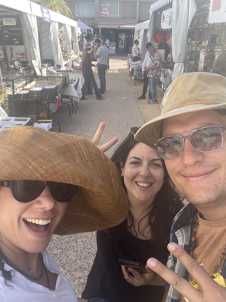 Leah Gillis meeting international gem dealers at the Tucson Gem Show, including the Italian team behind Chasing Gems, a Rome-based crystal and jewelry store.