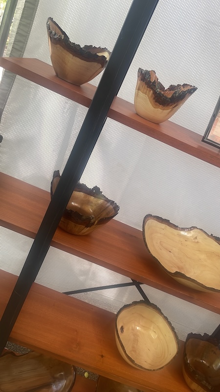 Close-up of handcrafted bowls made from felled pecan trees at Atlanta Dogwood Festival in Piedmont Park