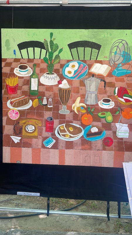 Large-scale paintings showcased by independent artists at Atlanta Dogwood Festival in Piedmont Park