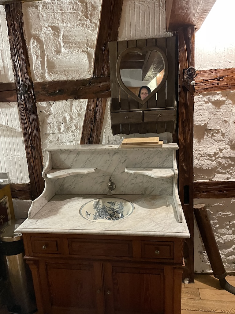 Rustic Strasbourg kitchen in historic building with old-world European charm