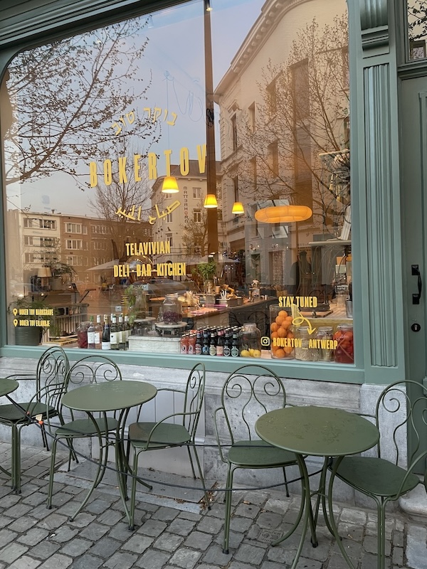 Breakfast setup near my Antwerp Airbnb with coffee, pastries, and bright city charm.