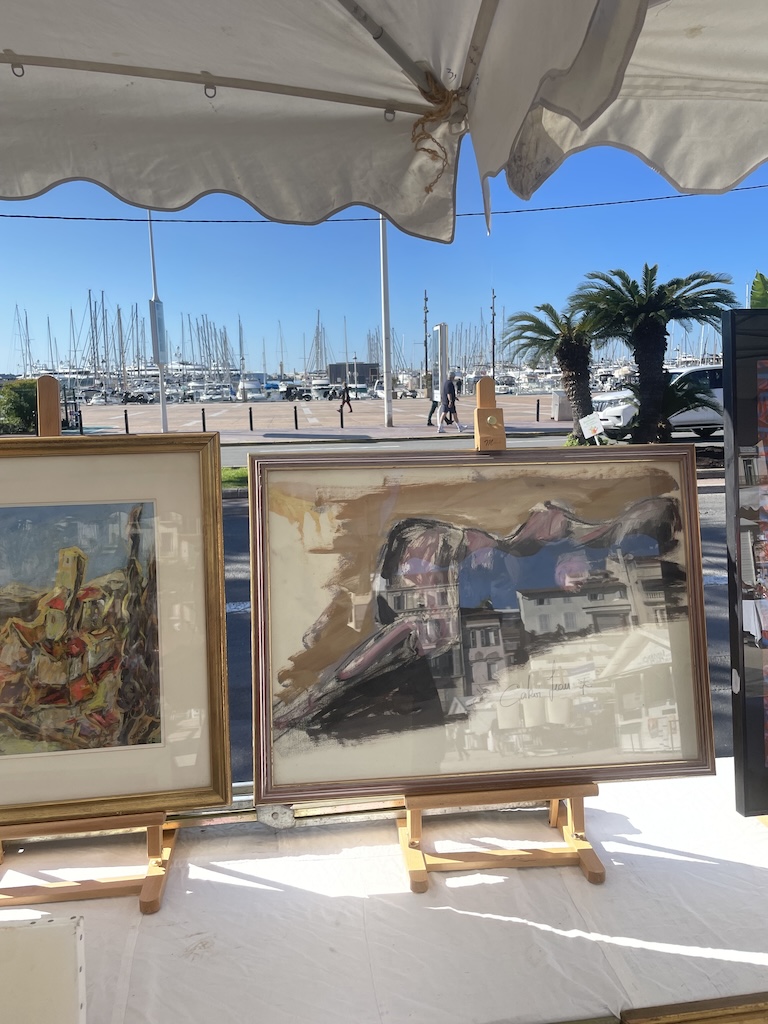 One of Cannes' local flea markets, where vintage treasures, antiques, and Riviera charm take center stage. Skip the celebrity clichés and you'll discover that off-season Cannes is a dream for curious travelers who love culture, people-watching, and unexpected finds. Photo by Leah Gillis, The Diamond Is You.